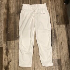 Nike boys white with black stripes baseball pants. Size S